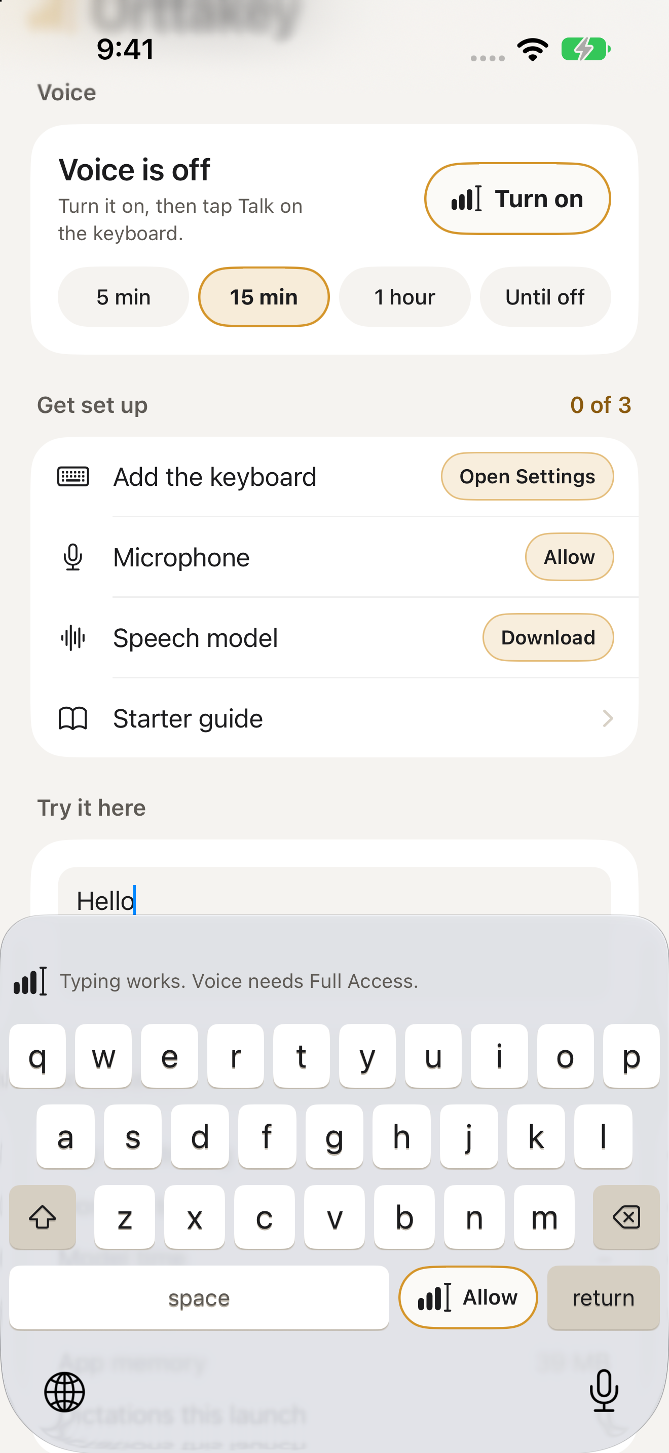 Orttakey’s iPhone keyboard typing Hello, with its voice key and warm amber branding
